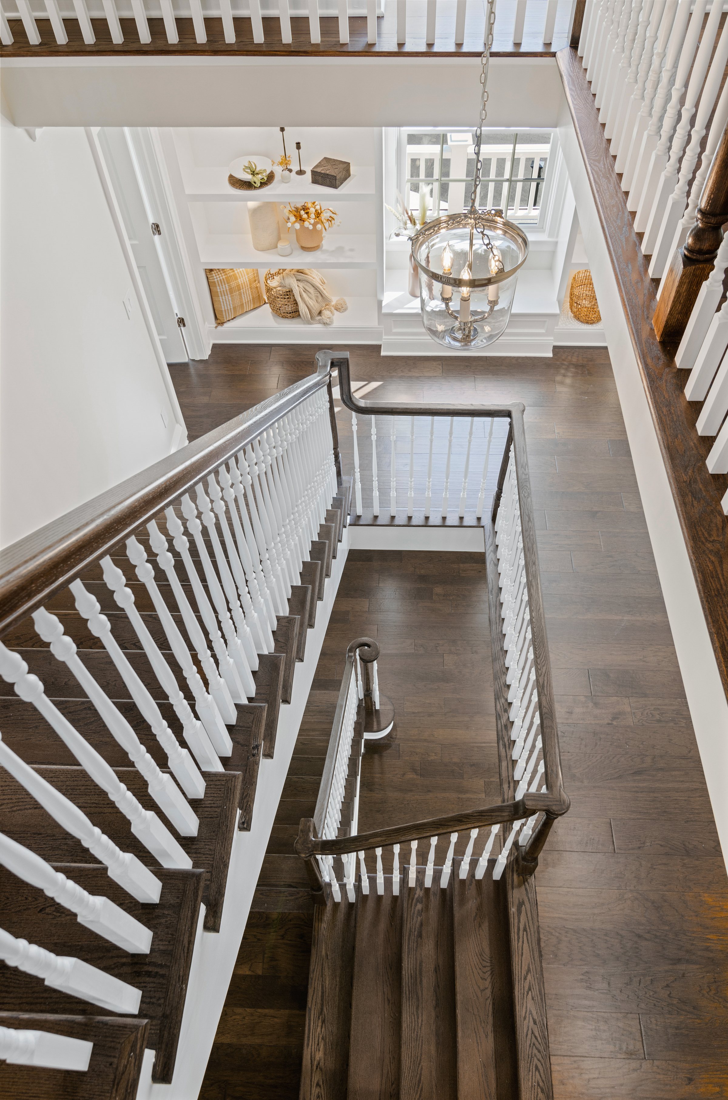 Custom staircase detail in a Foulke Construction residence
